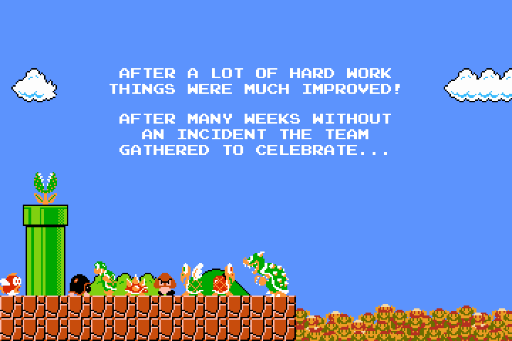Bowser and a variety of his minions are gathered outside near a green tube with a piranha plant sticking out of it.  A large pit to the right is filled almost to the top with dead Marios.  The text reads, 'After a lot of hard work things were much improved!  After many weeks without an incident the team gathered to celebrate...'